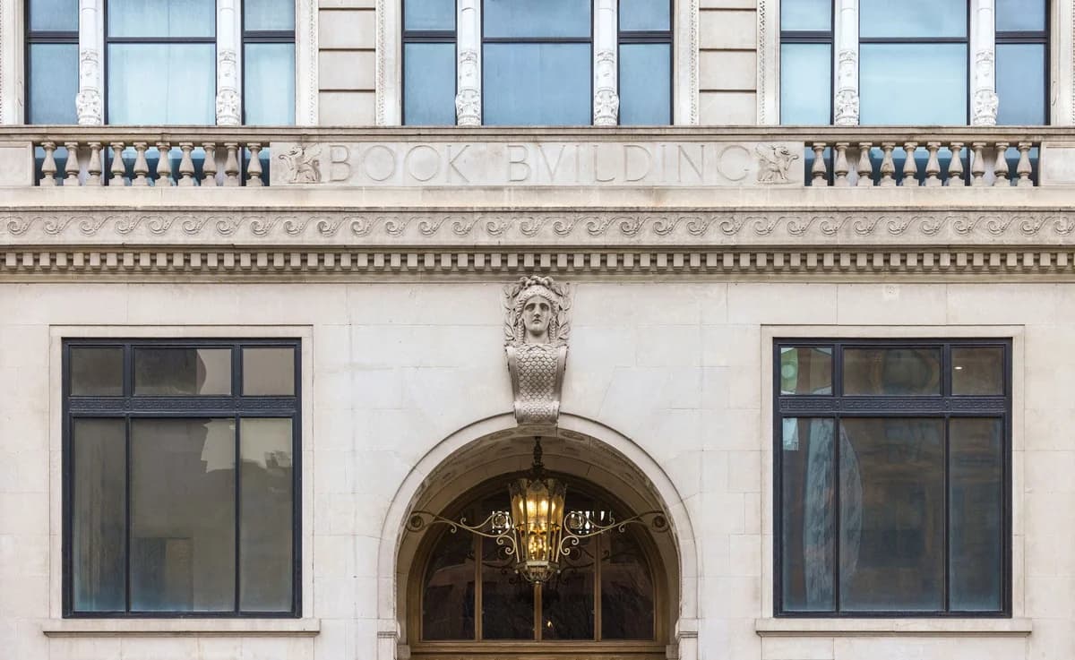 Detroit apartments for rent - image - Washington Boulevard entrance showing the facade with a chandelier and the word book building
