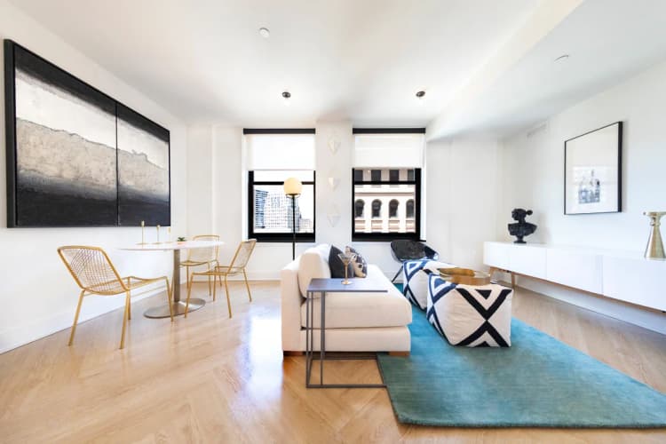 Detroit apartments for rent - image - Living room with modern furnishings and natural light.